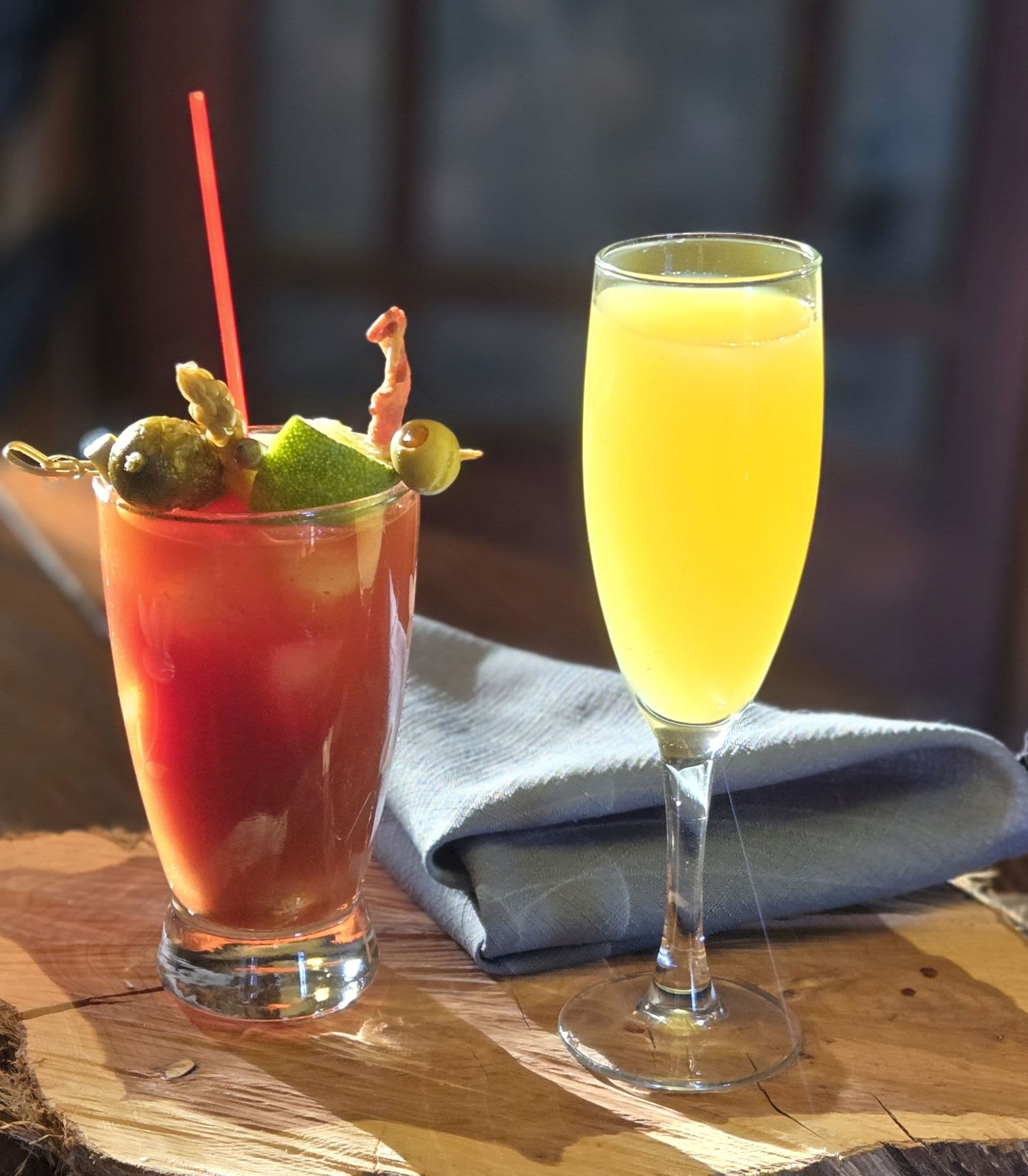 Sun Shining on a Bloody Mary with pickled garnishes and a Fluted Mimosa
