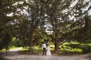 Wedding Couple Under the Pines